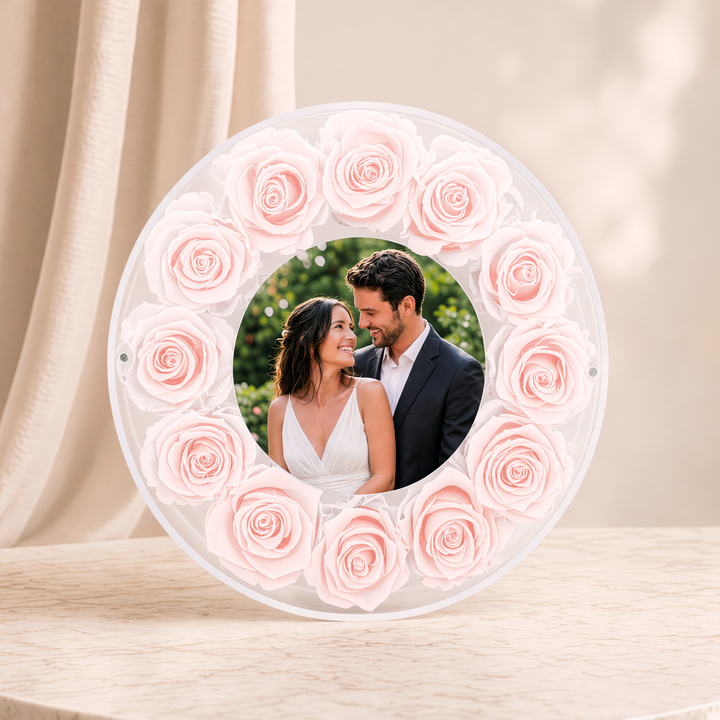 Large 10-inch round acrylic photo frame with blush preserved roses, front view