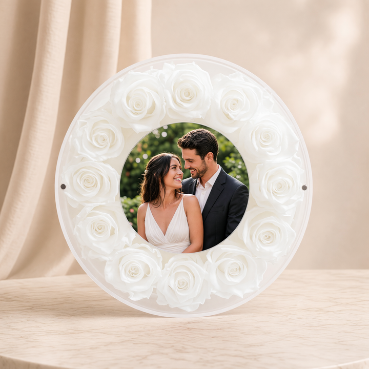 Large 10-inch round acrylic photo frame with white preserved roses, front view