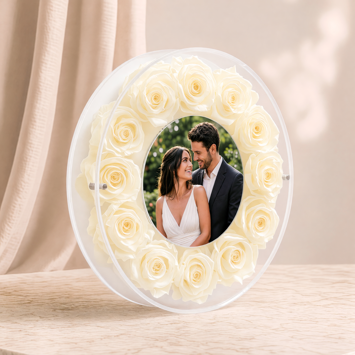 Large 10-inch round acrylic photo frame with cream preserved roses, angled view