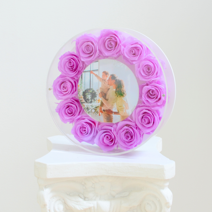 Original photograph of the lilac large Halo preserved rose frame, angle view on a white pedestal