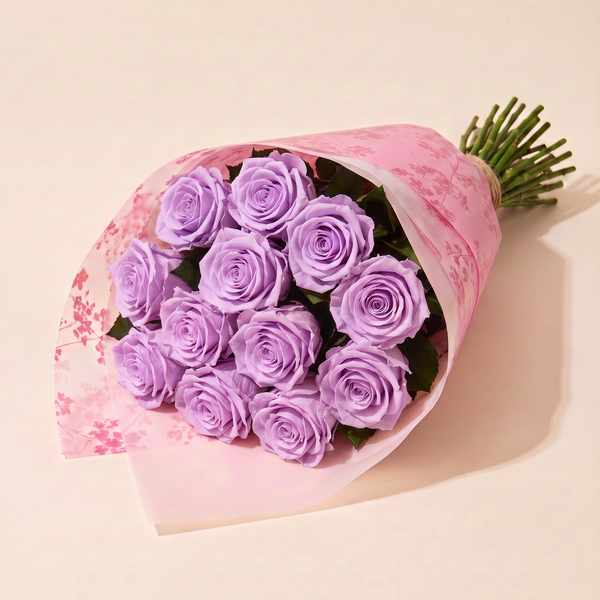 Dozen preserved roses in pink floral wrap - Lilac